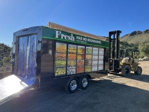 Exterior of custom refrigerated grocery trailer with fold down rear ramp