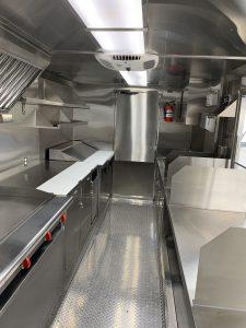 Interior of Happy Anchor seafood truck with NSF equipment