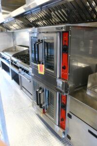 Catering trailer equipment inside CMK California Mobile Kitchens