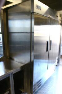 Catering trailer refrigerator inside CMK California Mobile Kitchens
