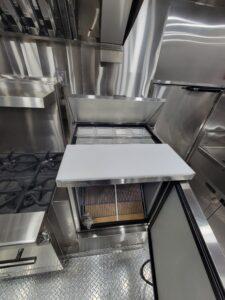 Prep fridge inside Mountain Lotus Provisions catering truck