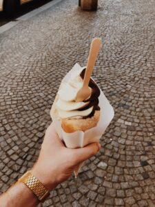 Vanilla chocolate swirl of soft serve ice cream in a cone