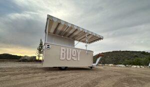 Buoy experiential marketing trailer at sunset