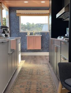 Galley kitchen inside of the Semihandmade mobile showroom truck