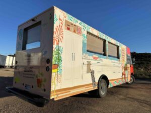 Exterior of Semihandmade experiential marketing vehicle from rear passenger's side angle