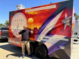 Happy owner receiving keys to his new food trailer